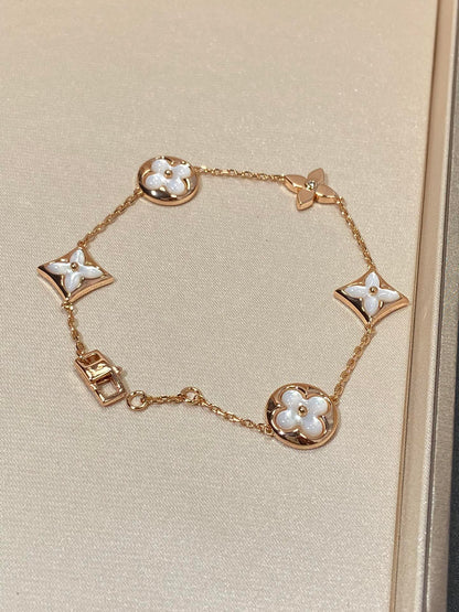 [moco jewelrys]STAR AND SUN 5 MOTIF MOP PINK GOLD BRACELET